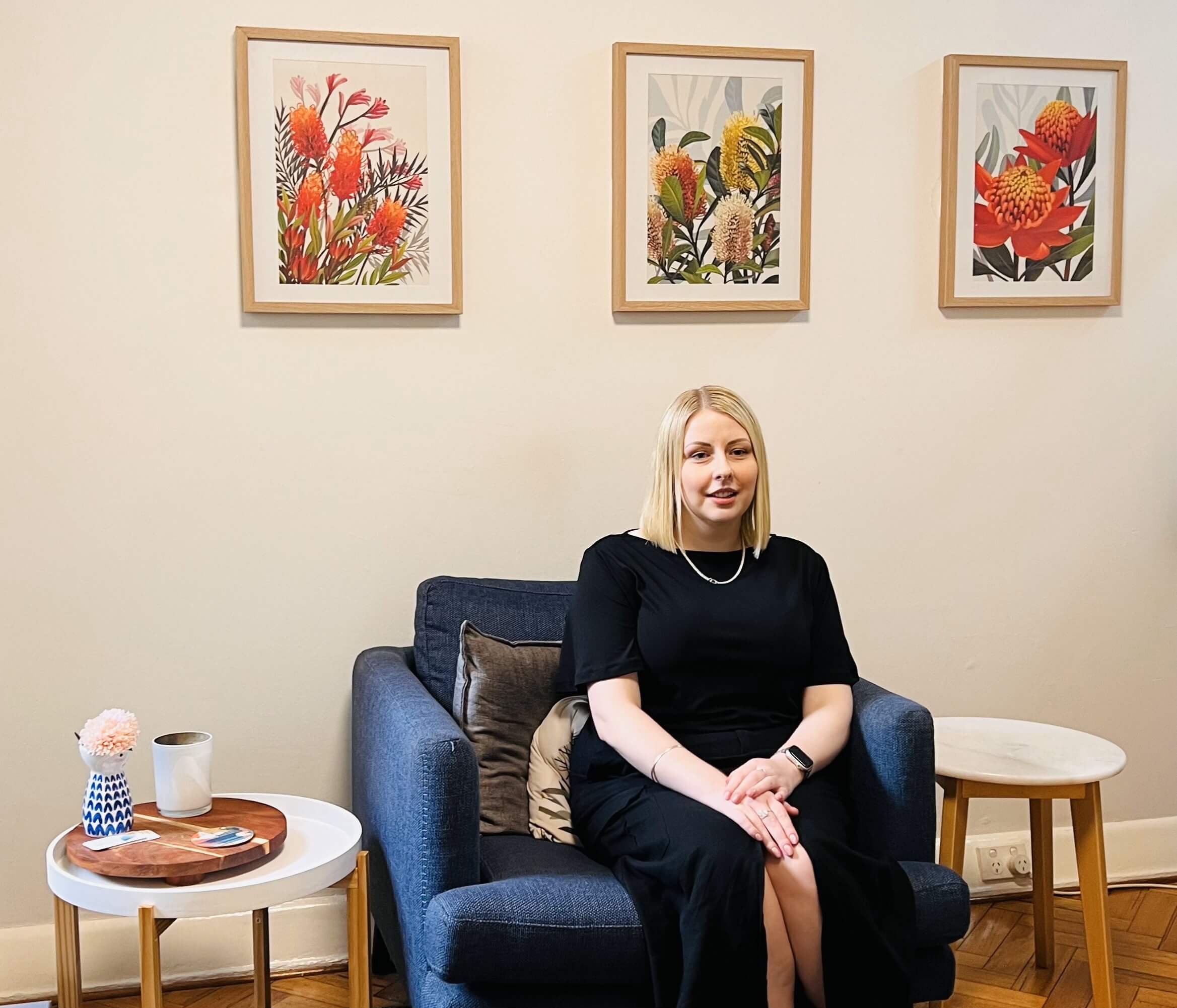 Person seated in a welcoming consultation room at Cova Psychology, Melbourne, reflecting a calm and supportive therapy environment.