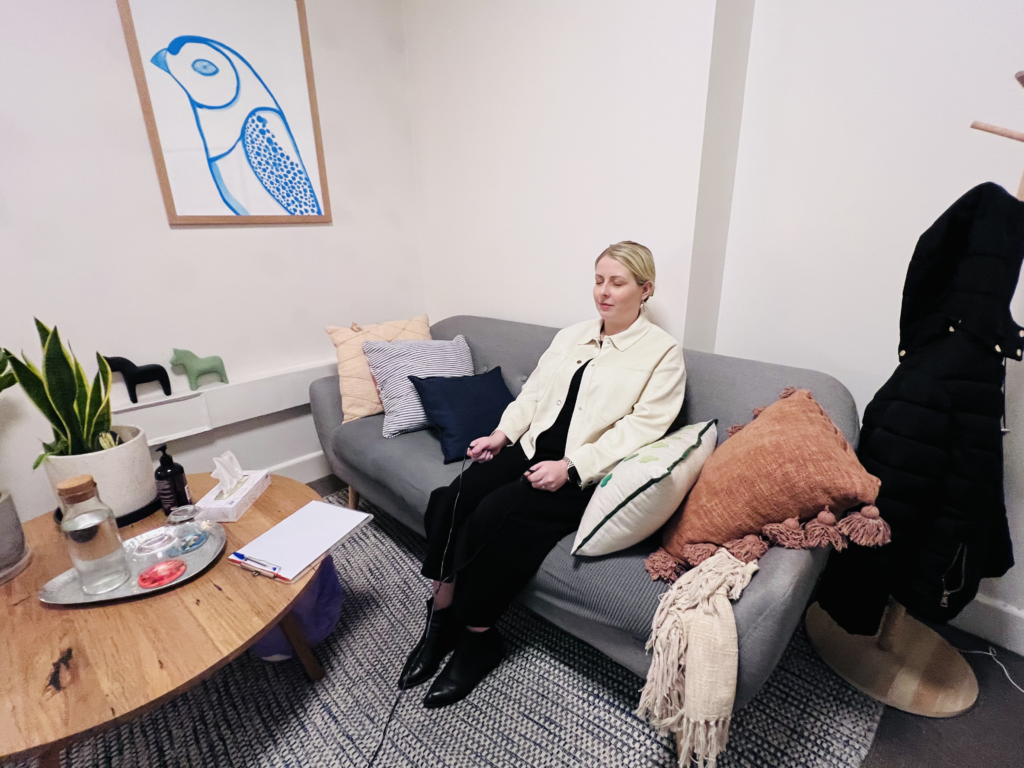 A client participating in bilateral stimulation during an EMDR therapy session at Cova Psychology's rooms in Melbourne, guided by a psychologist.